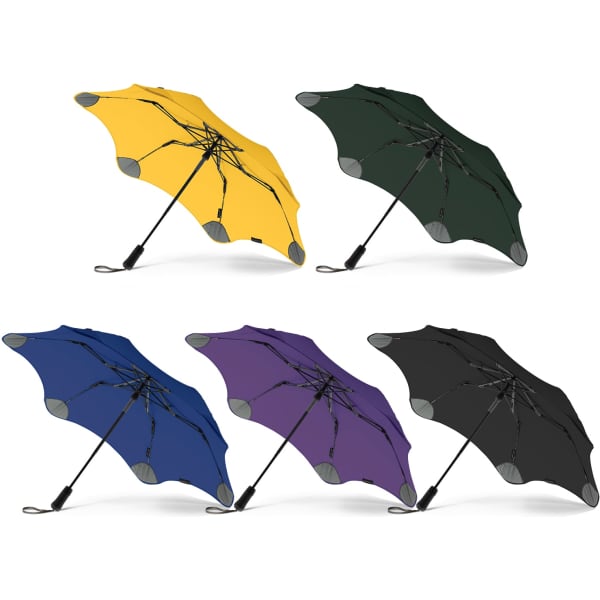 A collection of BLUNT Metro Umbrellas in yellow, green, blue, purple, and black, featuring a logo.