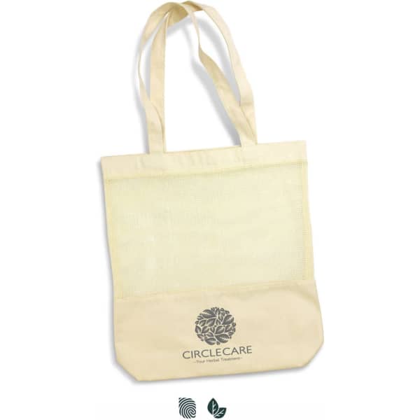 A cotton tote bag in cream with a mesh top and a logo printed on the front. It features two long handles.