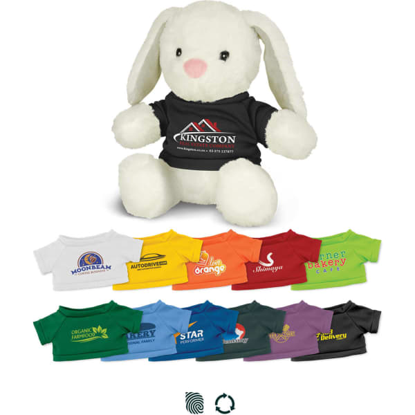 A soft white rabbit plush toy wearing a black shirt, surrounded by a variety of colourful shirt options.