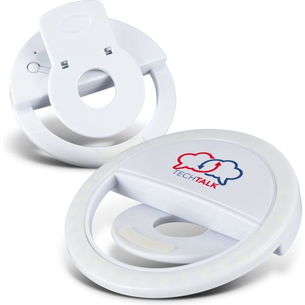 A white selfie phone light with a circular design, featuring a logo on the front.