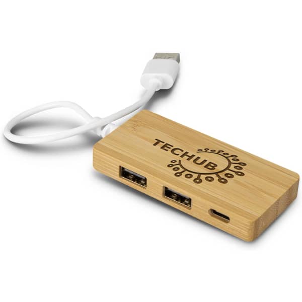 A bamboo USB hub with three ports and a white cable, featuring a branded logo on top.