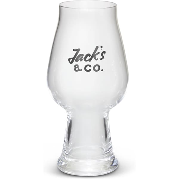 A clear, curved beer glass with a thick base and a printed logo on the front.