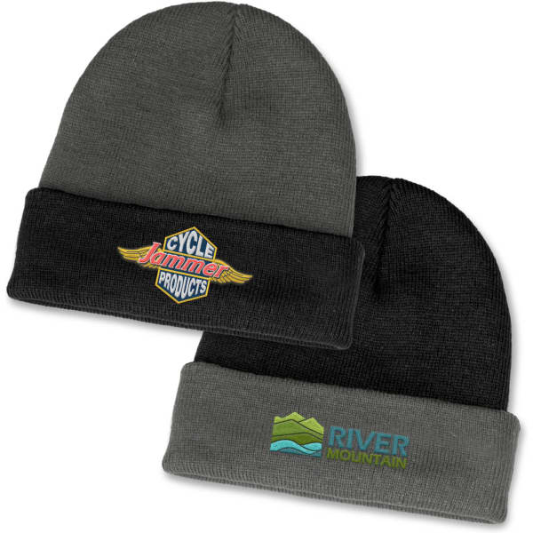 A two-toned beanie in dark grey and black, featuring a logo on each side.
