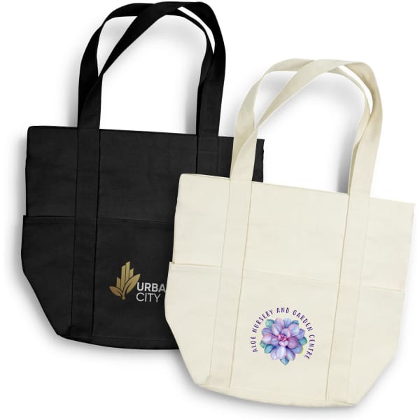 Two canvas tote bags: one black with a logo, and one cream featuring a floral design.