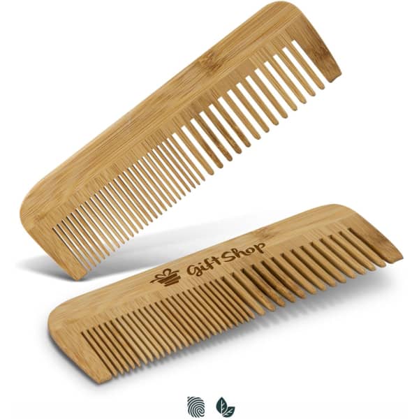 A bamboo hair comb in a light brown shade, featuring a logo on one side. Two combs are displayed, one angled over the other.