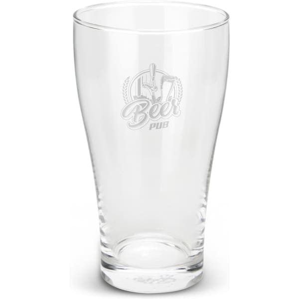 A clear beer glass with a tapered design and a logo etched on the surface.