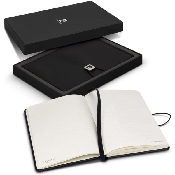 A black notebook gift set with a ribbon bookmark, presented in a matching black box. It features a logo on the cover.