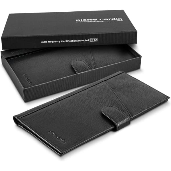 A black leather passport wallet in an open gift box, featuring a logo and RFID protection.