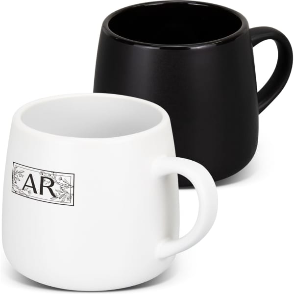 A set of two coffee mugs, one white with a logo and one solid black, featuring rounded designs.