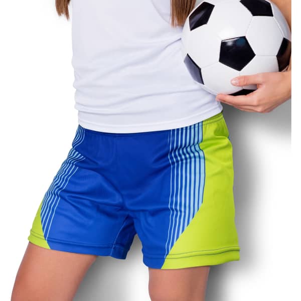 Custom women's sports shorts in blue and lime green, featuring a logo, paired with a soccer ball.
