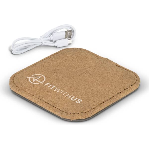 A square wireless charger in a natural cork colour with a logo and a USB charging cable.