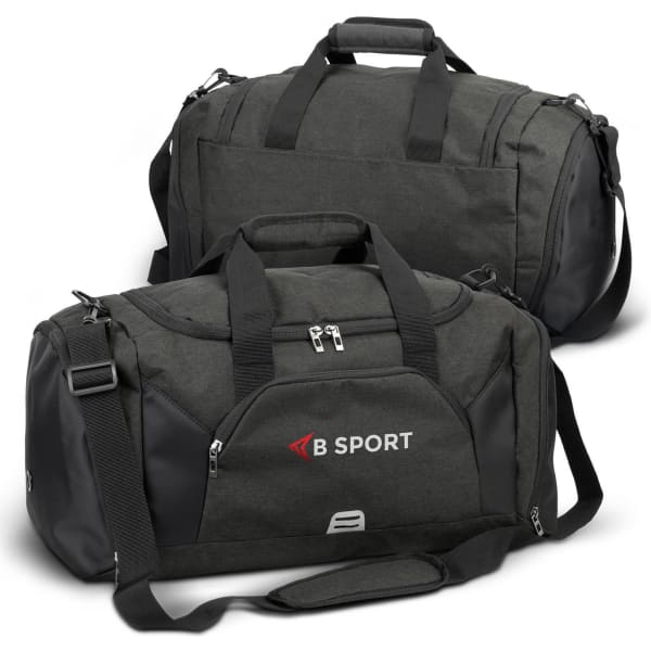 A green duffle bag features black accents and has a logo. It includes handles and a detachable shoulder strap.