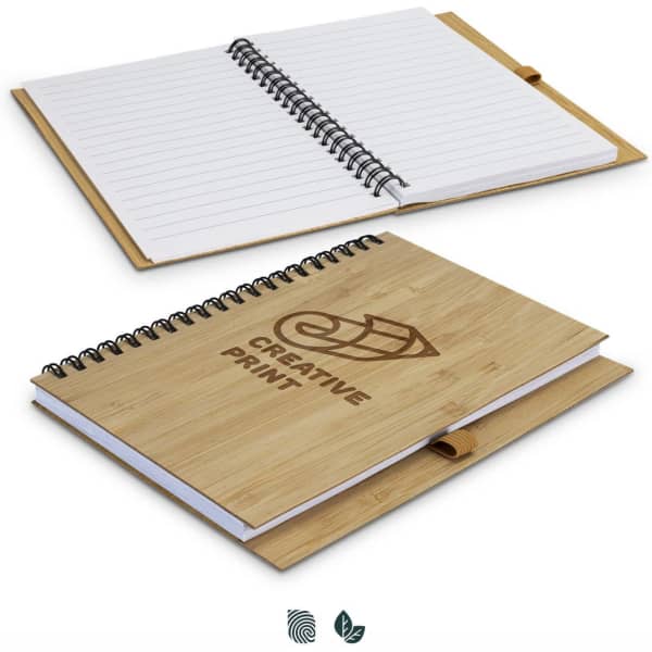 A medium bamboo notebook with a spiral binding, featuring a wooden cover and blank lined pages inside.