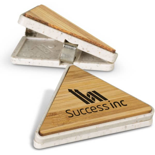 A triangular bamboo clip in natural tones with a logo, featuring a white base.