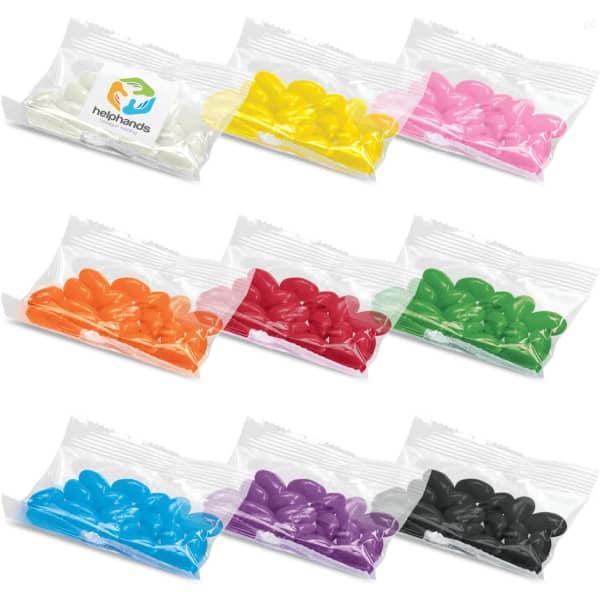 Eight bags of jelly beans in assorted colours including white, yellow, pink, orange, green, black, purple, and red, featuring branding.