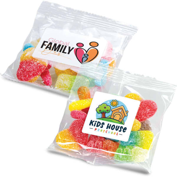 A transparent bag containing various colourful gummy candies, featuring two different logos on the packaging.