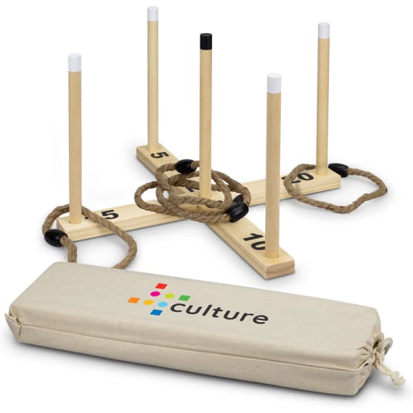 A ring toss game with wooden posts, a base, and rope rings, featuring a beige storage bag with a logo.