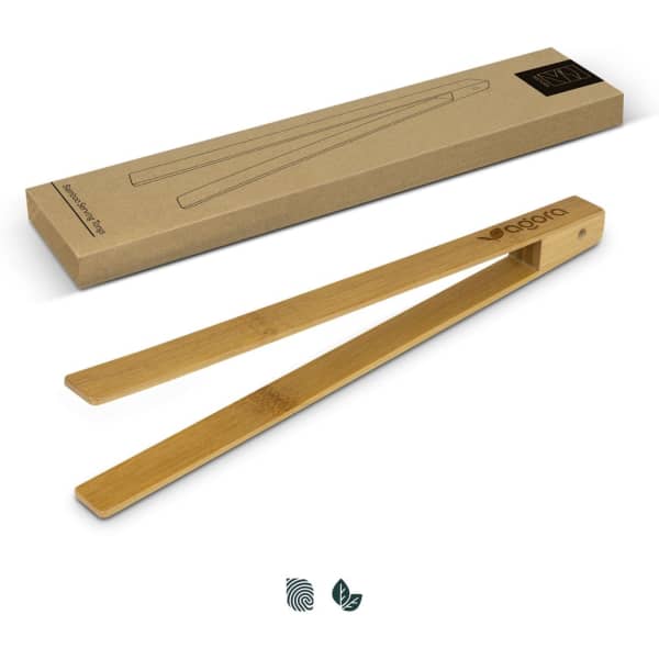 Bamboo serving tongs with a natural finish, presented in a simple cardboard packaging, featuring a logo.