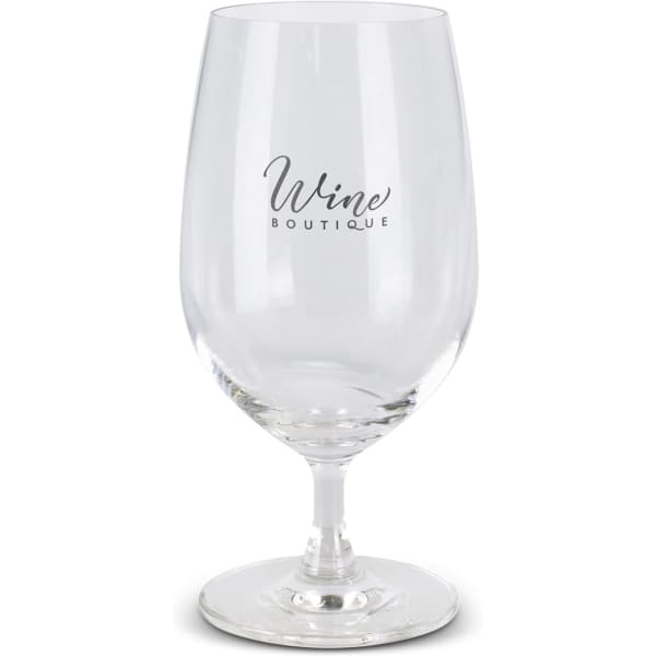A clear glass wine glass with a delicate stem, featuring a subtle logo on one side.