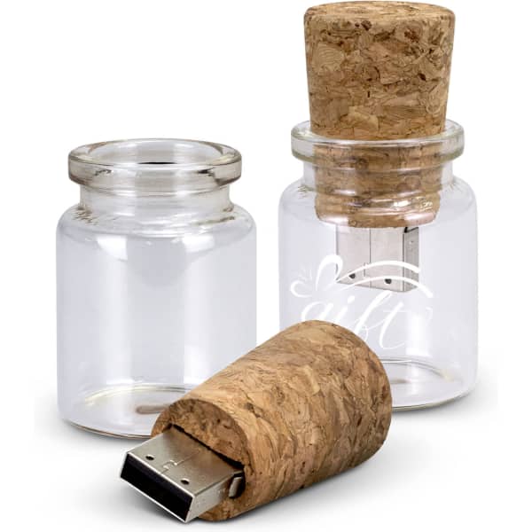 A transparent glass bottle with a cork lid containing an 8GB flash drive. Features a logo on the surface.