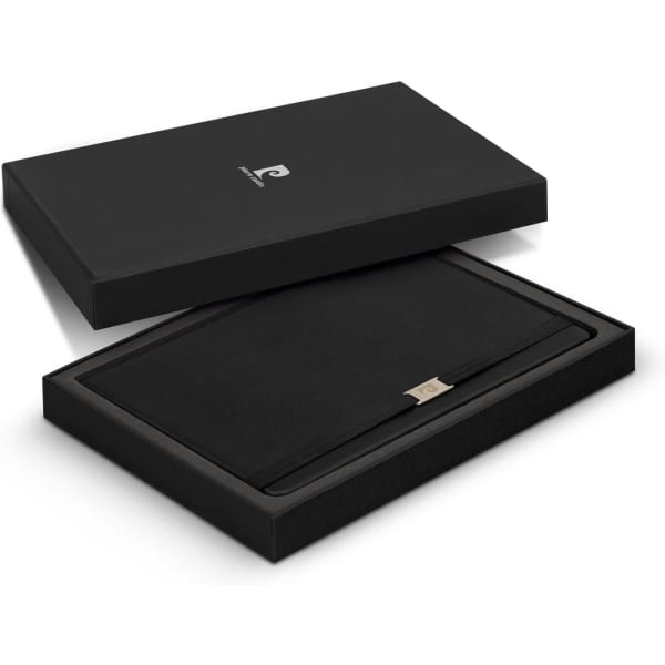 A black gift box with an open lid, containing a sleek black notebook set with a branded logo.