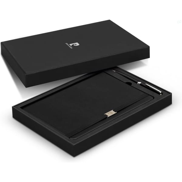 A black gift set featuring a notebook and pen, presented in a sleek black box with a logo.
