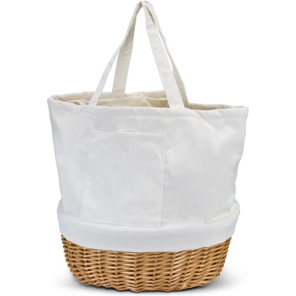 A white tote bag with woven wicker bottom and two handles. It features a front pocket and a logo.