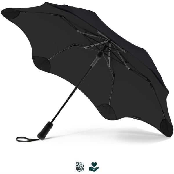 A black umbrella with a unique design and a sturdy handle. It features a logo on the handle.