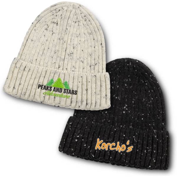 A pair of beanies, one cream with a logo and green text, and one black with orange text, both featuring a ribbed design.