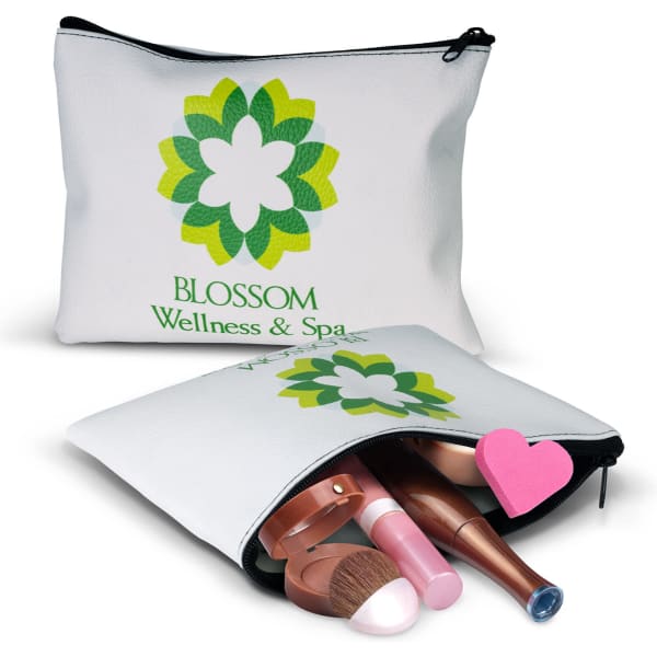 A white cosmetic bag with a floral logo, partially open showing various makeup products inside.