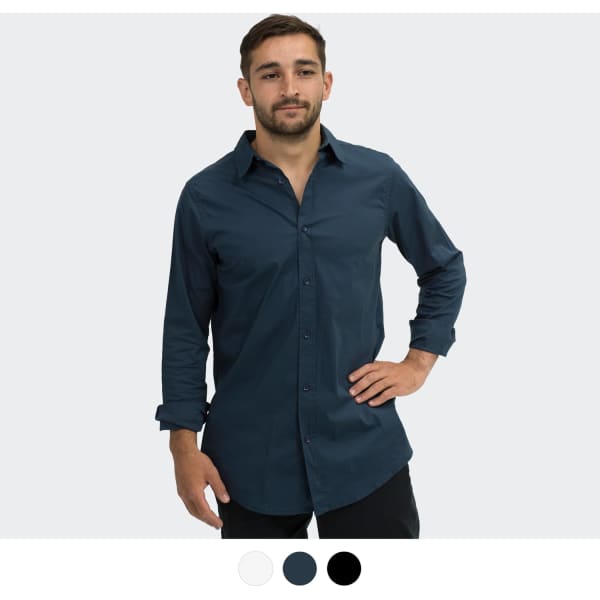 A man wearing a navy blue button-up shirt with long sleeves and a collar. The shirt has a logo.