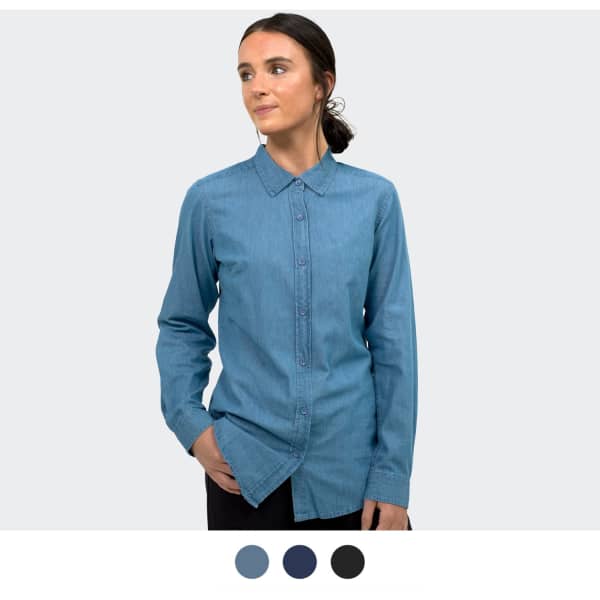 A women's button-up denim shirt in a light blue shade, featuring a collared neckline and long sleeves.