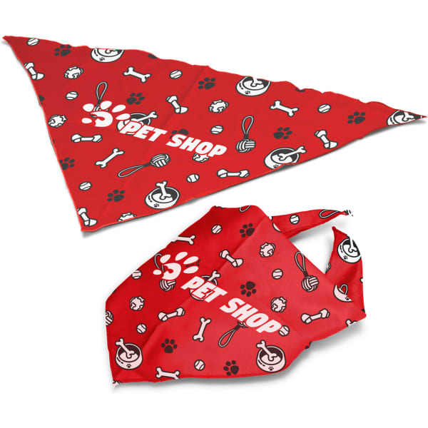 A large red pet bandana featuring playful patterns of bones, paw prints, and toys, with a logo.