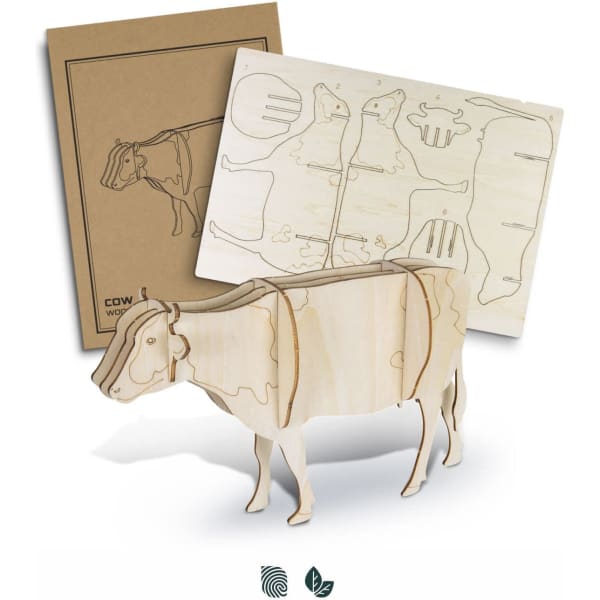 A wooden cow model in natural wood colour, accompanied by assembly sheets. The model features a simple design with a logo.