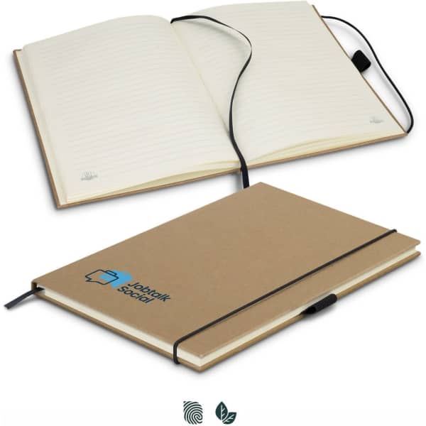 A hard cover notebook with a beige cover, featuring lined pages and a black elastic strap, includes a branding logo.