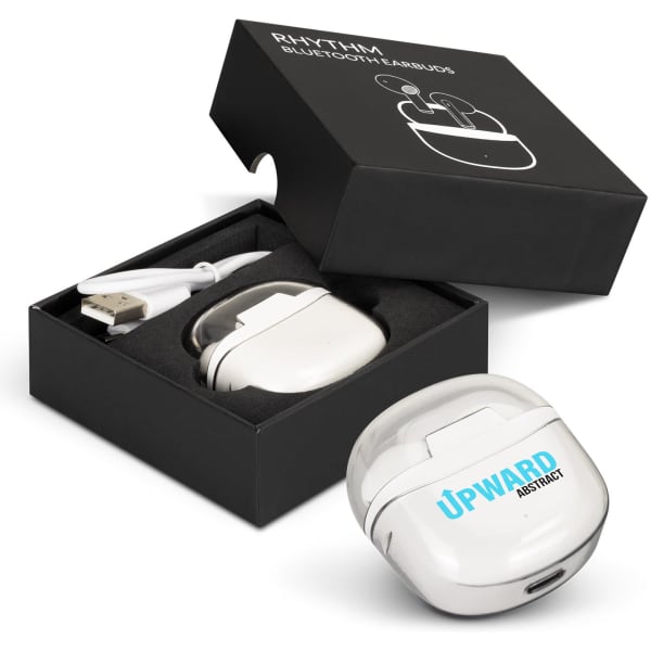 A pair of white Rhythm Bluetooth earbuds in a black box, accompanied by a USB charging cable.