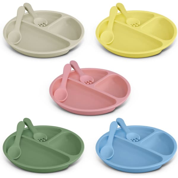 A set of five kids' plate sets in pastel colours: green, blue, pink, yellow, and beige, each with a matching spoon.