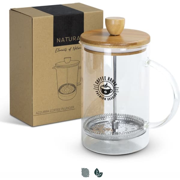 A glass coffee plunger with a bamboo lid sits next to its kraft box packaging.