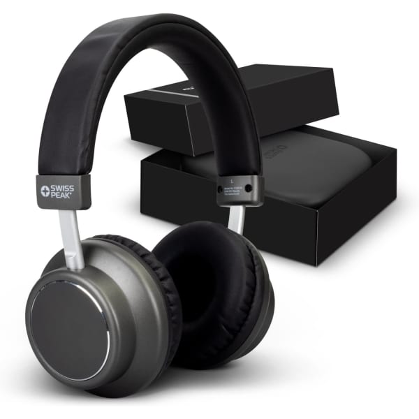A pair of grey wireless headphones with a black cushioned headband, accompanied by a black box.