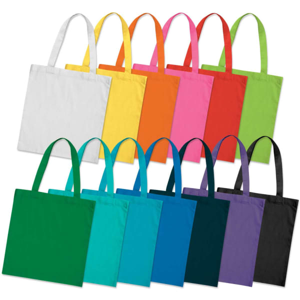 A collection of colourful cotton tote bags in various shades, including white, yellow, pink, green, and black, with handles.
