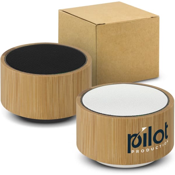 A bamboo Bluetooth speaker in black and white, accompanied by a small kraft box. The speaker has a logo on it.