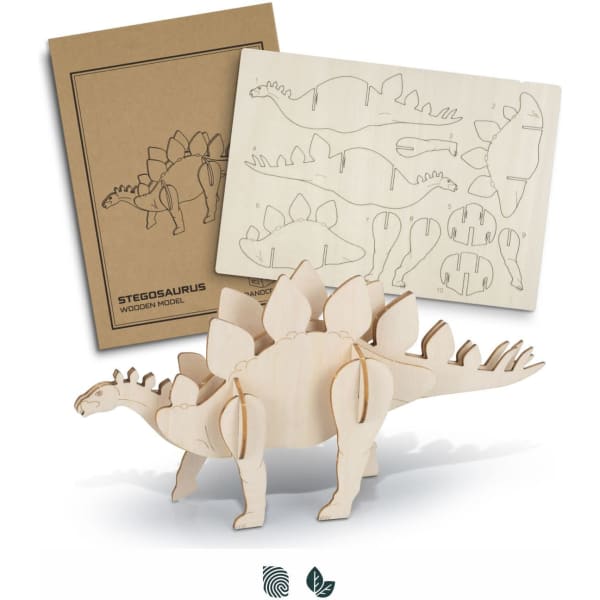 A wooden model of a stegosaurus in natural wood colour, alongside pre-cut assembly sheets.