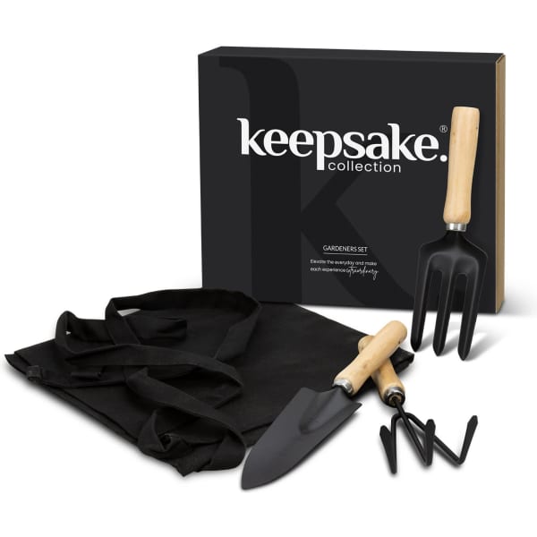 A black gardening set featuring a trowel, fork, and gloves, presented in a sleek black box with a logo.