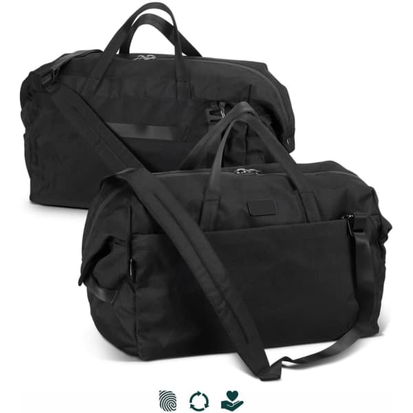 A black duffle bag with two handles and a detachable shoulder strap, featuring a logo and a sleek design.