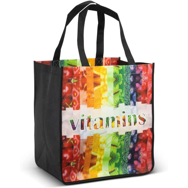 A tote bag featuring a vibrant design with various fruits and vegetables in bright colours, along with a logo.