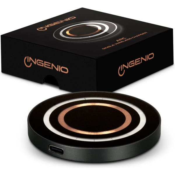 A black wireless charger with a sleek design and a circular charging area, accompanied by its packaging featuring a logo.