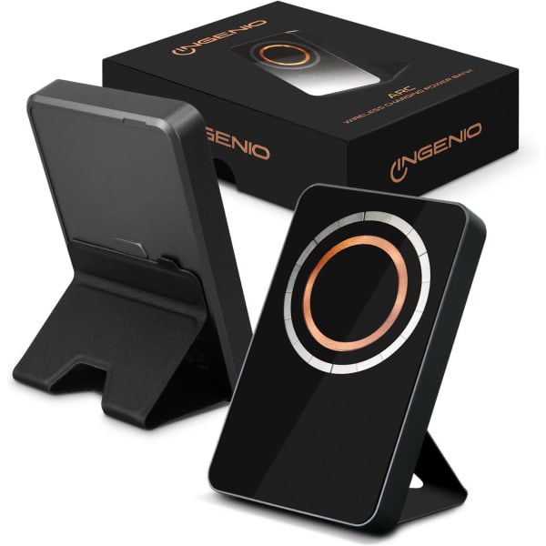 A black wireless charging power bank with a circular design and a stand, accompanied by its packaging featuring a logo.
