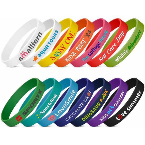 A selection of colourful silicone wristbands with various logos and text designs in different colours.