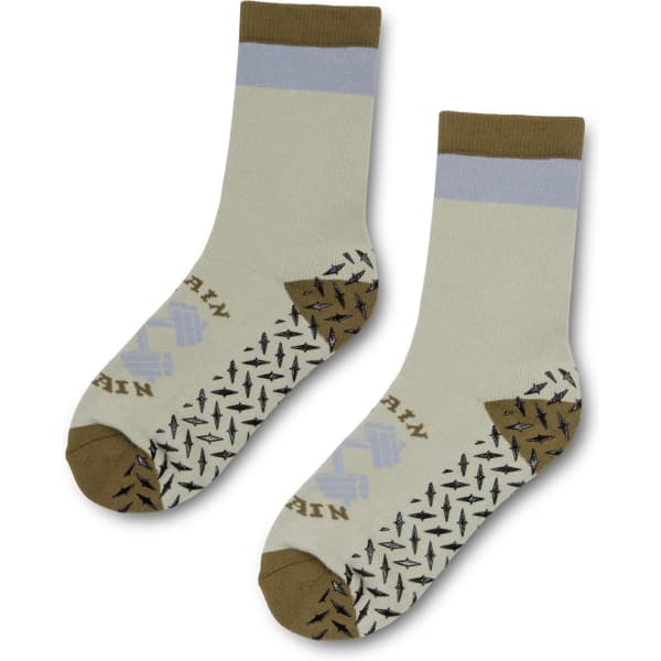 A pair of crew grip socks in light green, brown, and grey featuring a patterned sole and a logo.