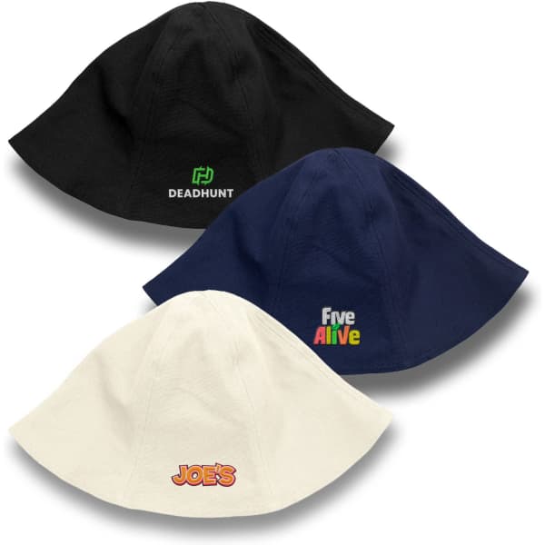 Three bucket hats in black, navy, and cream, each featuring different logos or branding.
